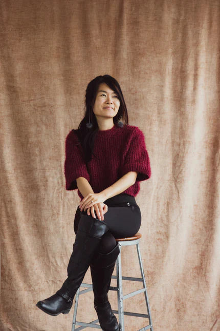 files/a-model-perched-on-a-stool-smiles_430x_430x_266fb282-e388-4d6c-b48a-6e00857a5e5f.webp